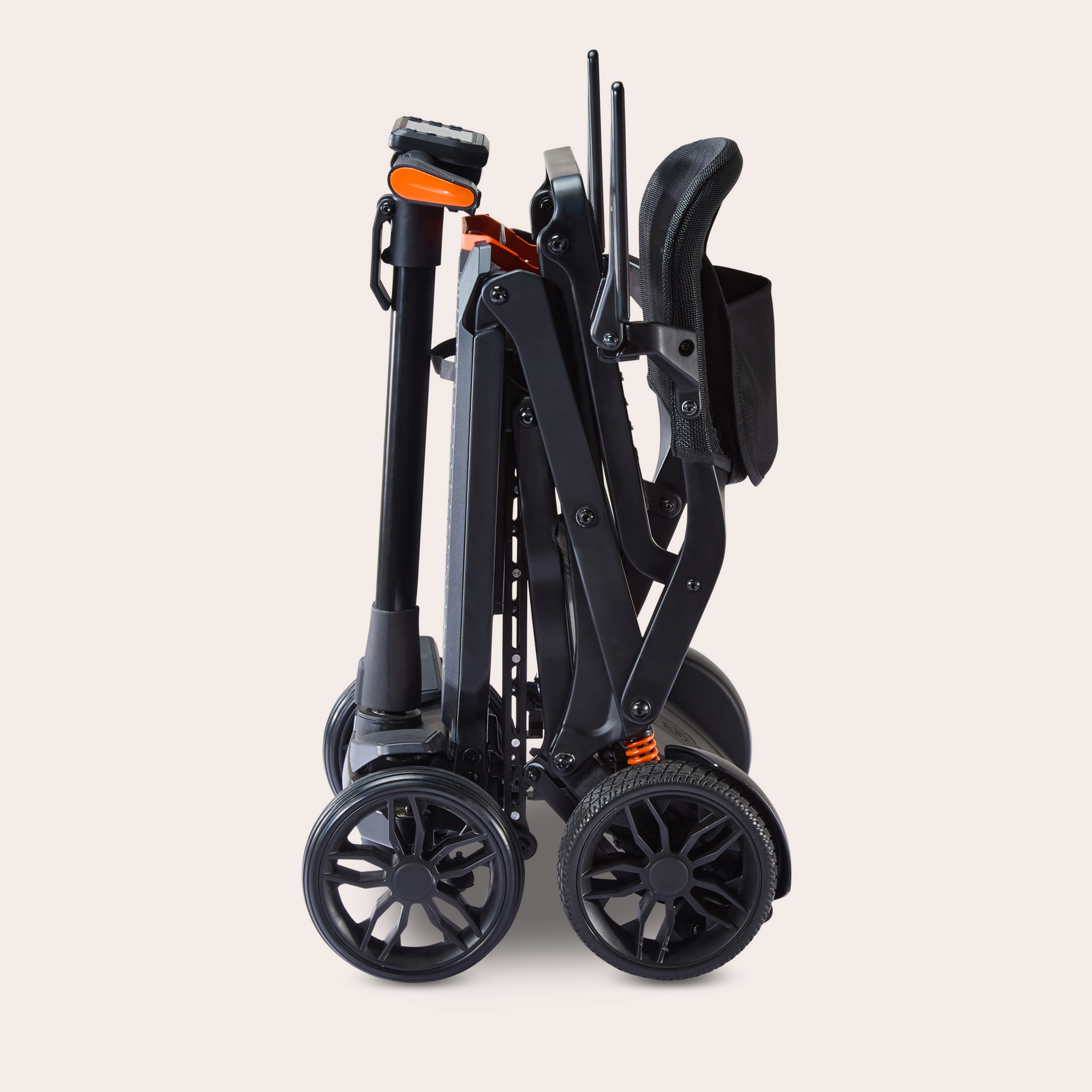 Side view of standing folded Humfree carbon scooter