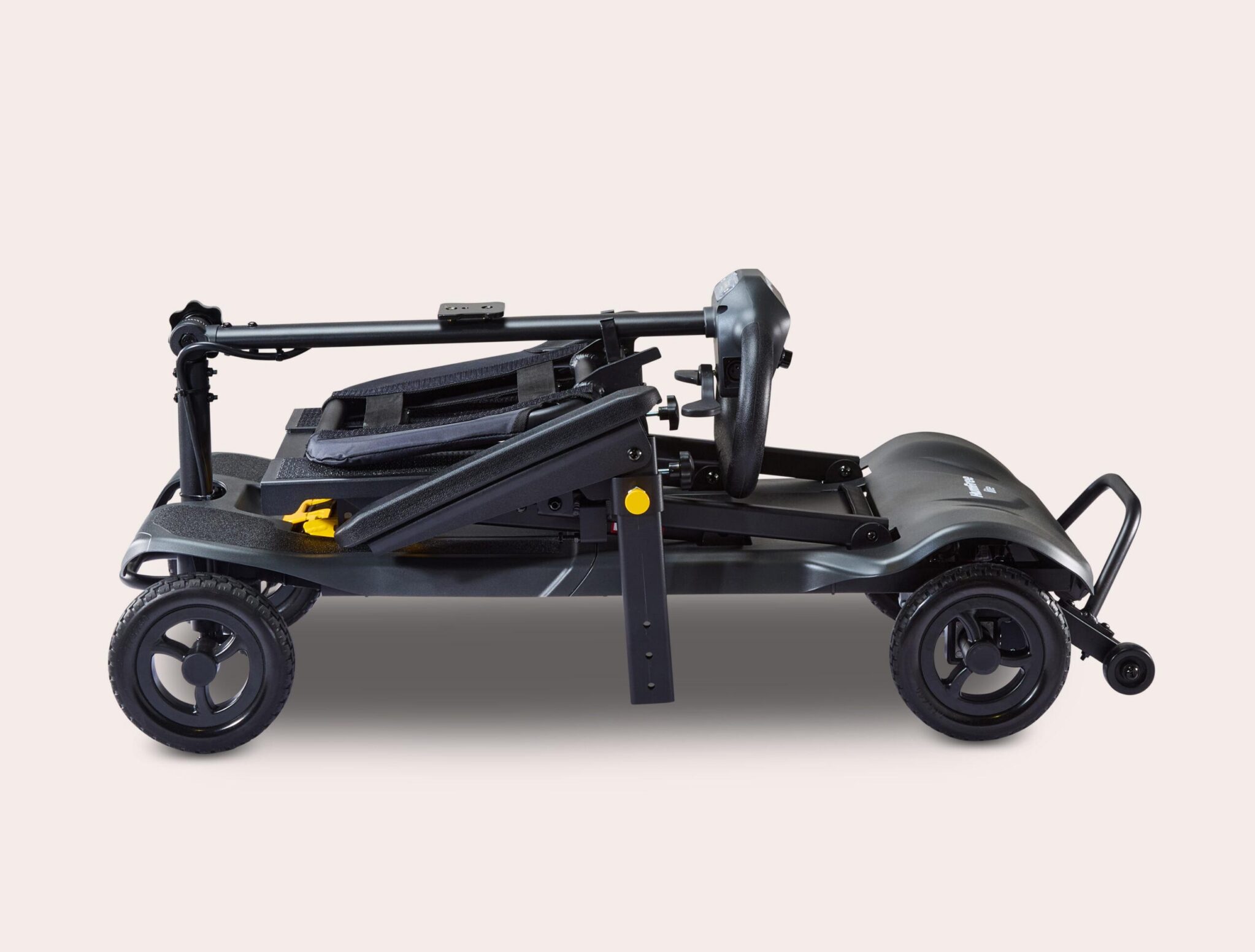 Side view of folded charcoal Humfree lite scooter
