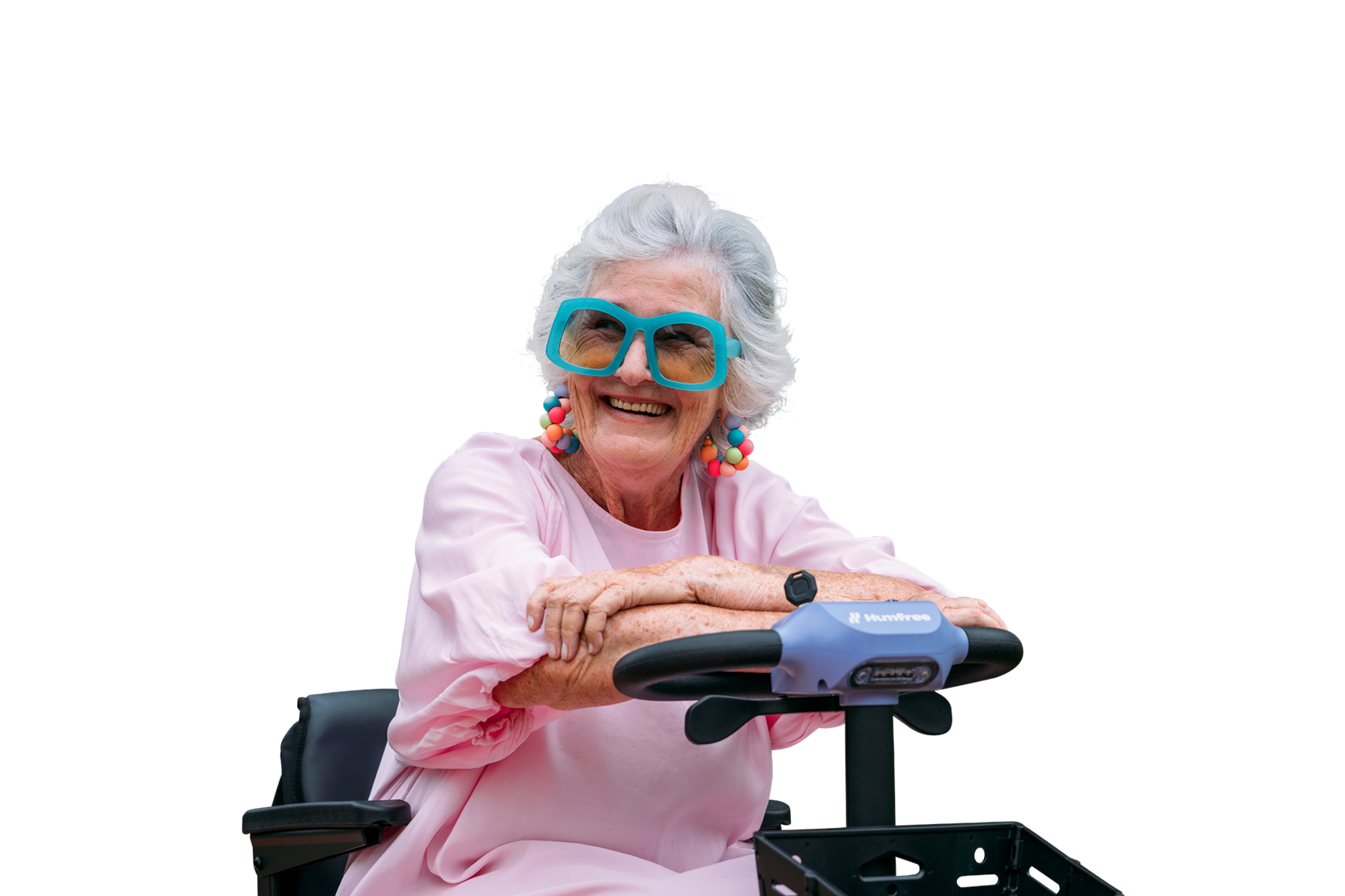 Older woman wearing a pink dress and bright blue glasses smiling with her arms crossed on the wheel of the amethyst lite scooter she is sitting on