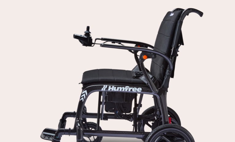 Side view of the Charcoal Humfree Glide wheelchair